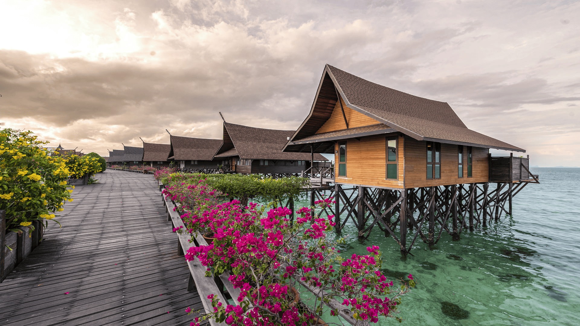 kapalai stilt chalets at sunset