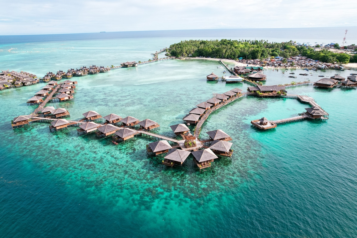 boat over sipadan lagoon